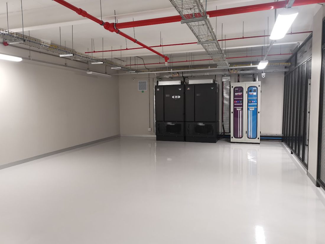Data centre hall with UPS and power distribution units